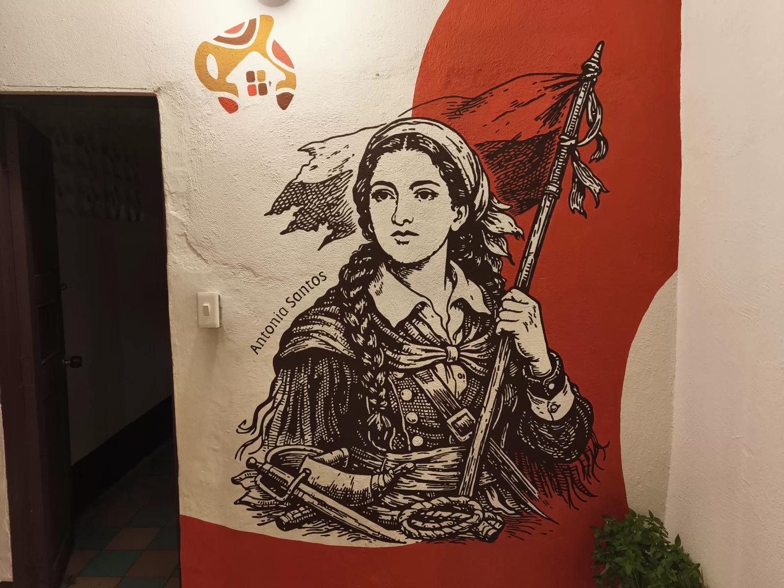 Mural de Antonia Santos en CHINOME HOSTAL